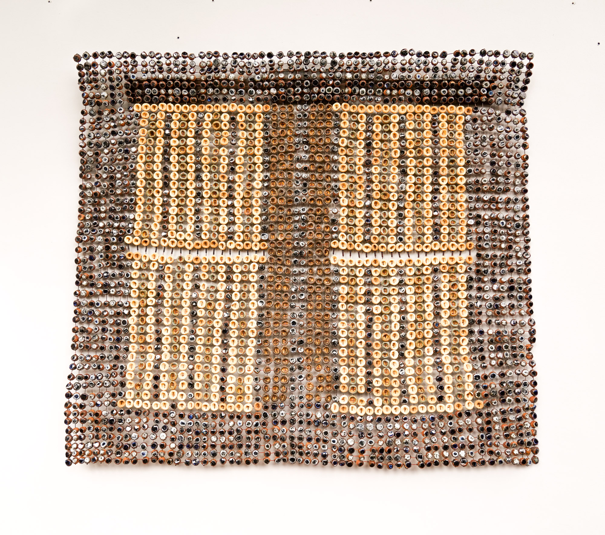 Akwaete Woman's Weave II, 2023
earthenware and stoneware clays, ash glazes, recycled glasses and copper wires (2,800
ceramic palm kernel shell beads)
47.6 x 52.75 x 3.5 in (121 x 134 x 9 cm) -  Marc Straus Gallery